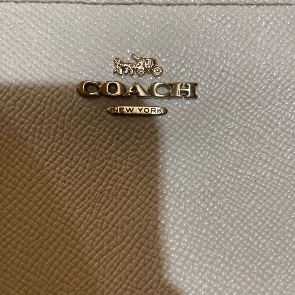 Coach Gold-Logo Pebbled Leather Wristlet in cream color - Picture 3 of 9